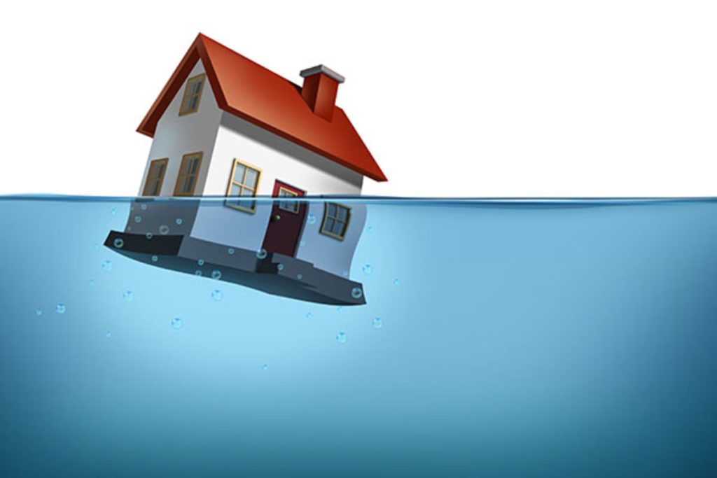a house floating in the water with a red roof