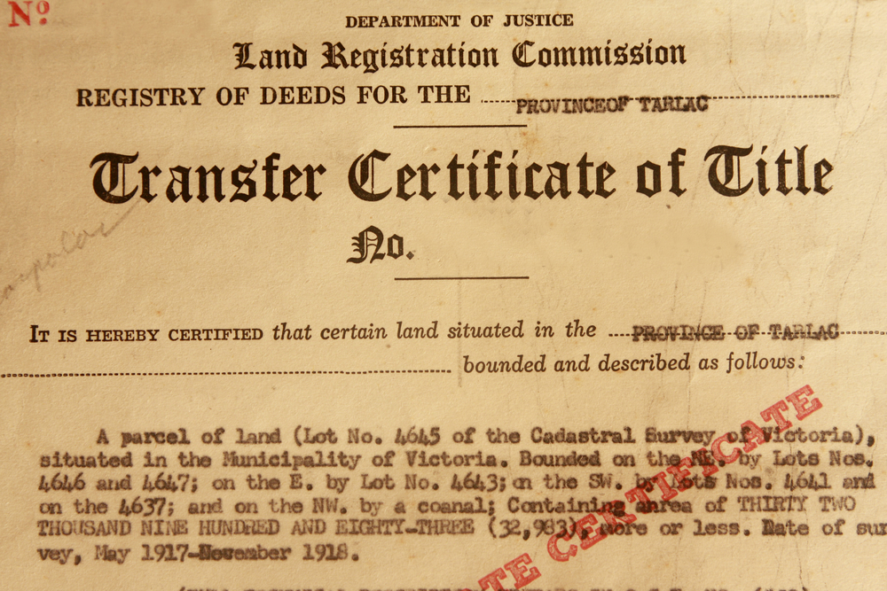 an old document with a red stamp on it