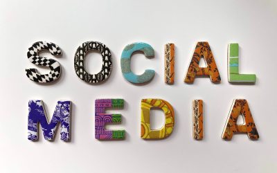 the word social media spelled with colorful letters